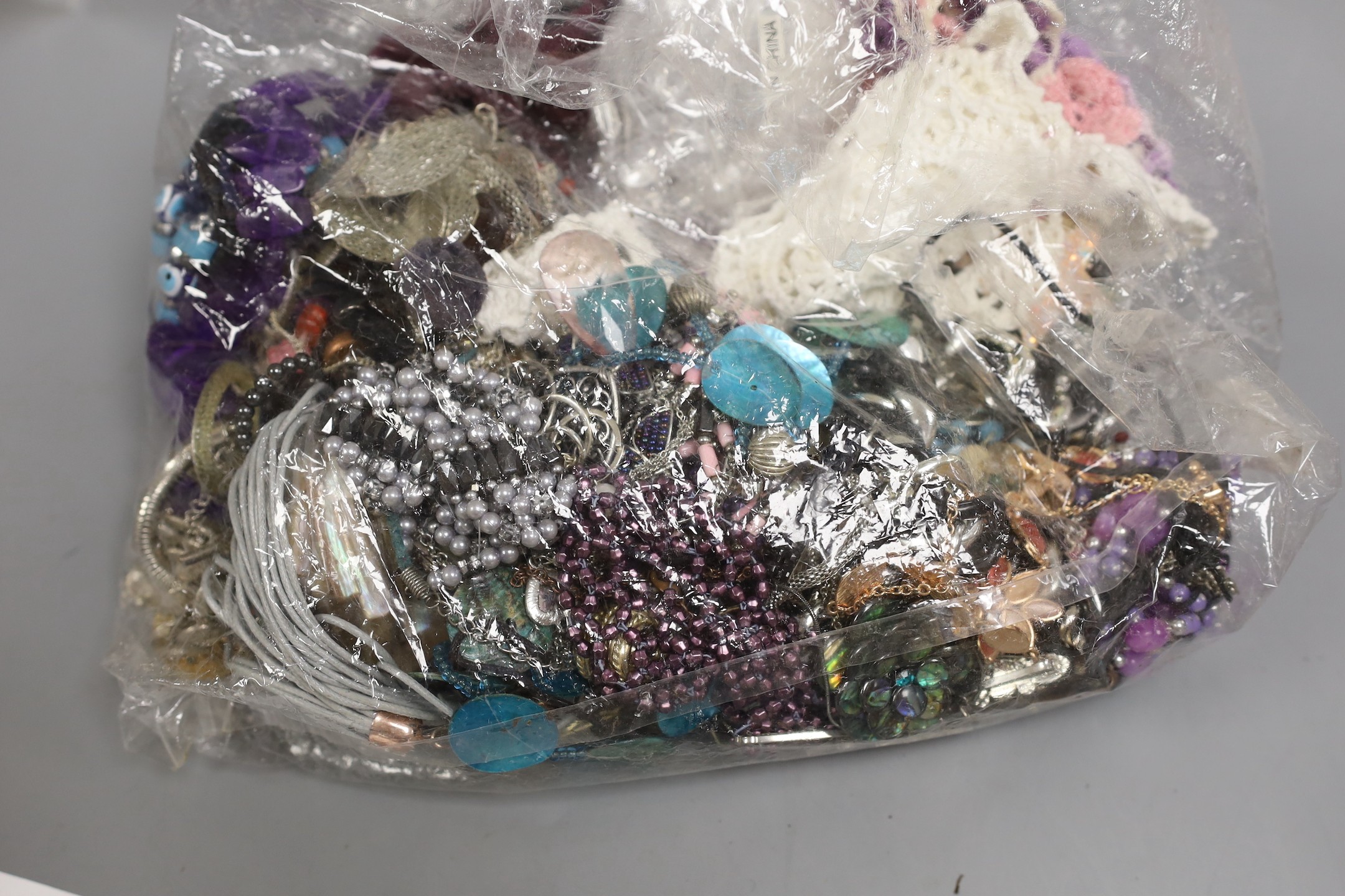 A large quantity of assorted costume jewellery.